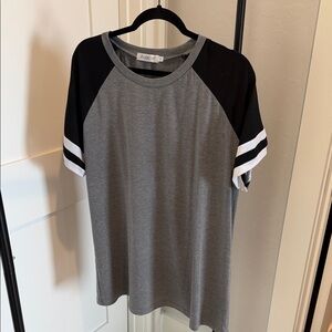 Gray and black T-shirt with striped short sleeves
